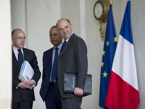 Frans Minister van Economie, Financiën en Buitenlandse Handel Pierre Moscovici (vooraan).