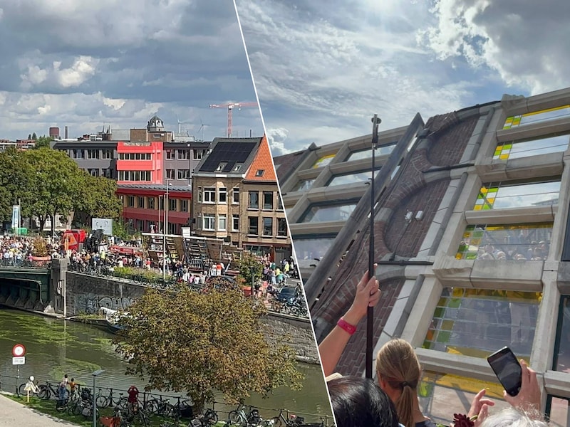 De wissel van de Gentse gevels aan de Bargiebrug., Er is bijzonder veel volk op de been om de gevels door de Gentse straten te zien.