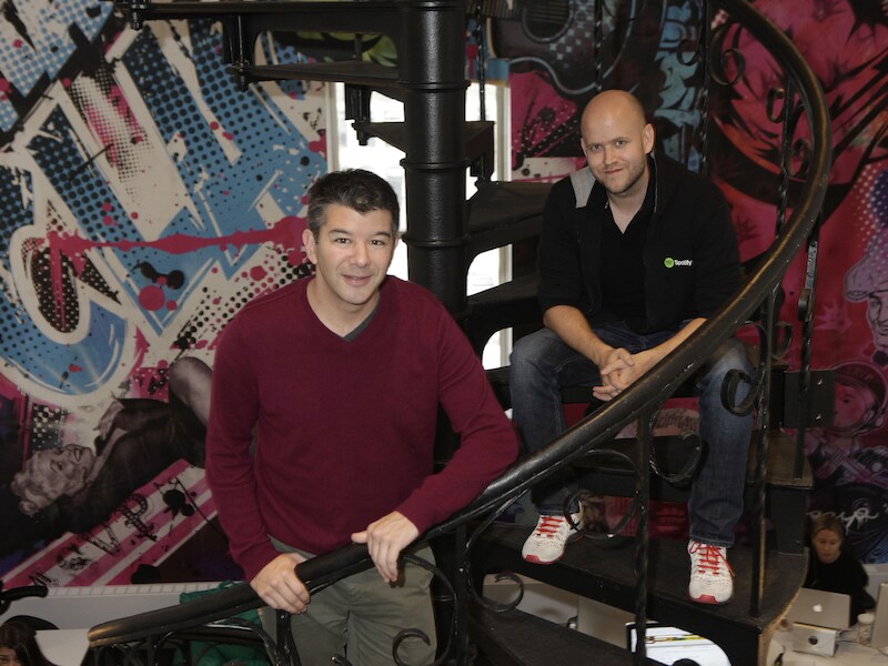 Uber-CEO Travis Kalanick (l.) en Spotify-CEO Daniel Ek kondigden onlangs een samenwerking aan.