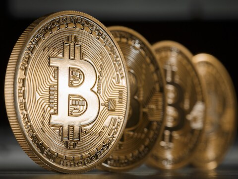 Bitcoins, hier afgebeeld als een muntstuk, maar eigenlijk is het een virtuele munteenheid waar geen geldstukken aan te pas komen.