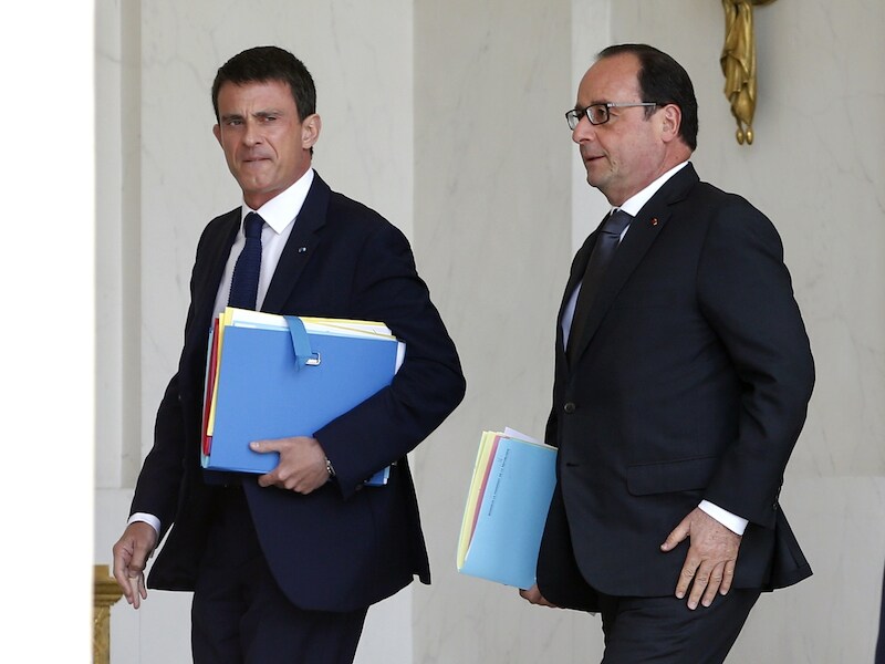 Frans president Francois Hollande (R) en eerste minister Manuel Valls.