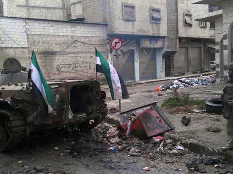 Uit deze foto van de Nationale Raad moet blijken dat het regime de grote middelen inzette tegen de demonstranten in Homs.