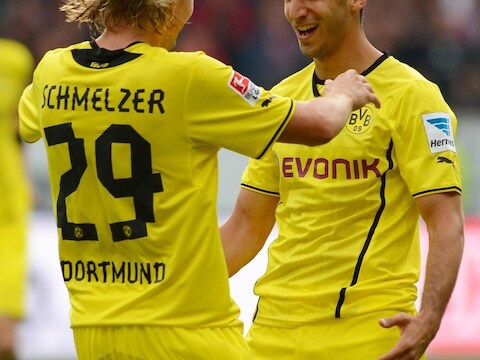 Henrikh Mkhitaryan (r) tekende voor beide treffers aan de kant van Dortmund.