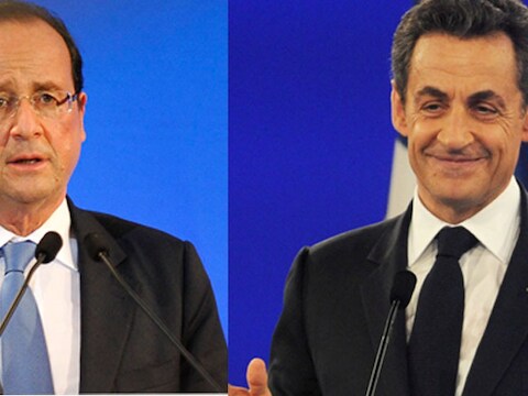 Hollande (links) legt in een peiling voor het eerst de duimen tegen Sarkozy.