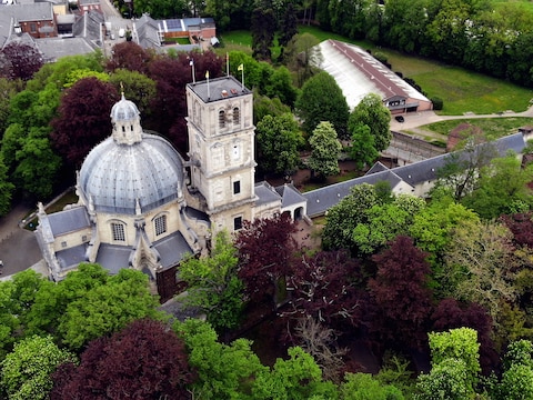 Aerial drone picture shows the city center of Scherpenheuvel with the Basilica of Our Lady of Scherpenheuvel (Basiliek van Onze-Lieve-Vrouw van Scherpenheuvel - Basilique Notre-Dame de Montaigu), a popular pilgrimage shrine, in Scherpenheuvel-Zichem, Tuesday 11 May 2021. BELGA PHOTO ERIC LALMAND