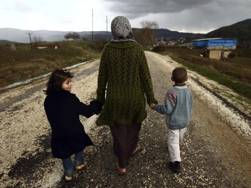 Syrische vluchtelingen bij de grens van Turkije.