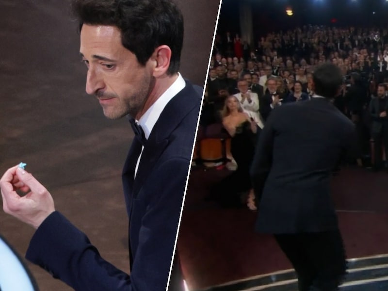 KIJK. Adrien Brody gooit kauwgom naar zijn vriendin net voor hij Oscar in ontvangst moet nemen