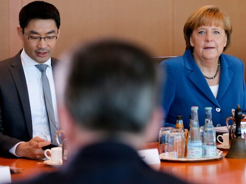 Philipp Rösler en Angela Merkel.