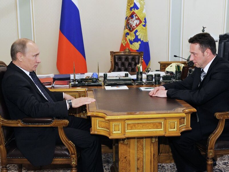 Vladimir Poetin en Igor Cholmanskich.