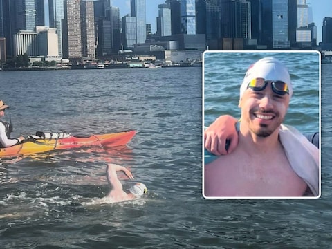 Tim Peeters (inzet) uit Mechelen zwom als eerstes Belg ooit de ‘20 Bridges around Manhattan’ in New York City, en hoe!