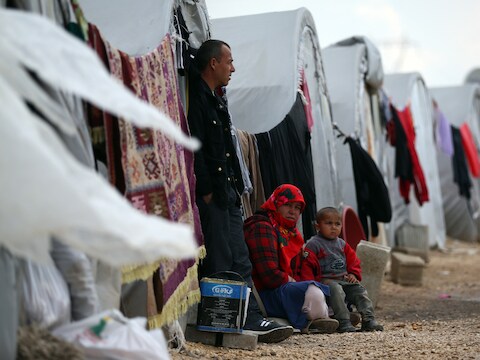 Syrische vluchtelingen in een vluchtelingenkamp.