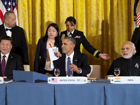 De Chinese president Xi Jinping en de Amerikaanse president Barack Obama tijdens een werkdiner in het Witte Huis.