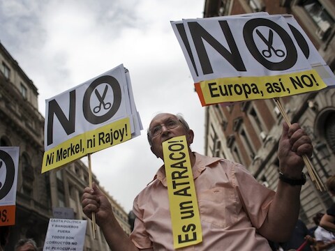 Spanjaarden protesteerden vorige vrijdag tegen het Europese crisisbeleid van Merkel en Rajoy.