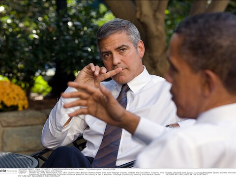 George Clooney tijdens een ontmoeting met president Obama.