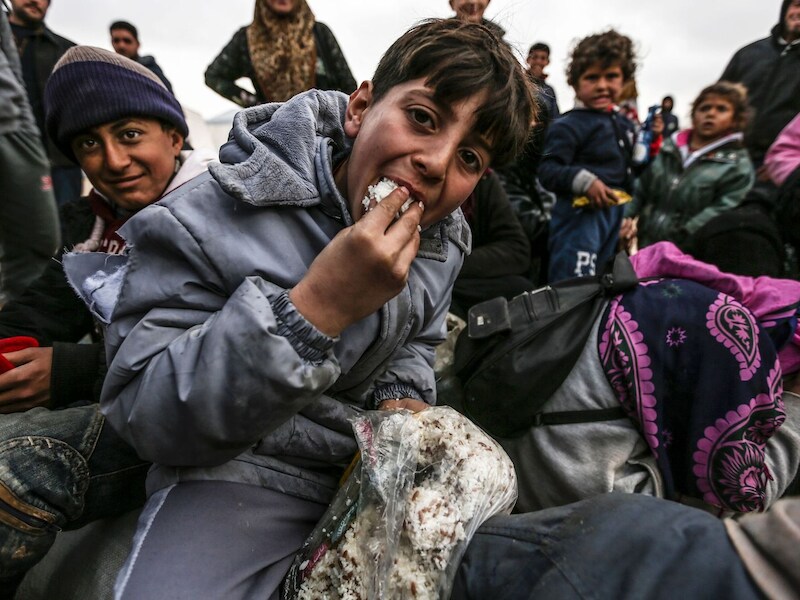 Syrische vluchtelingen uit Aleppo in een kamp vlakbij de grensstad Azaz.