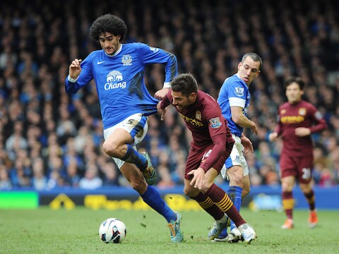 Marouane Fellaini (hier in duel met Javi Garcia van Manchester City) wil een stap hogerop zetten.