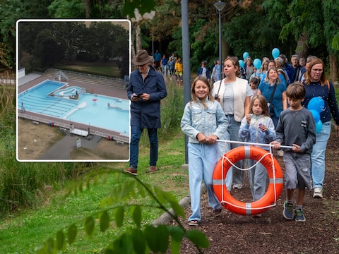 Een hondertal mensen kwam samen voor een wandeling aan domein De Warande. Daarmee vragen ze inspraak over de toekomst van het openluchtbad (inzet), dat na 75 jaar sluit.