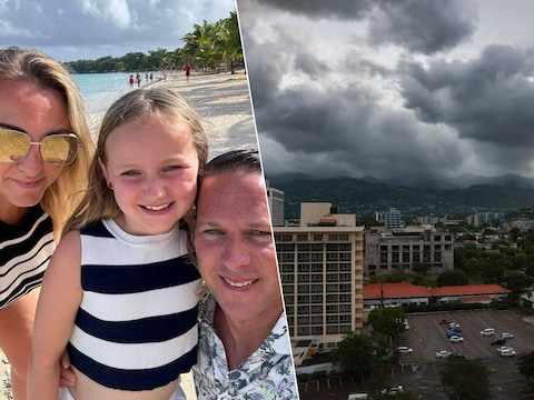De Vlaamse Roel Stassen, met zijn vrouw Dana en dochtertje Marie. Rechts een beeld van Kingston, in het oosten van Jamaica, waar donkere wolken zich samenpakken.