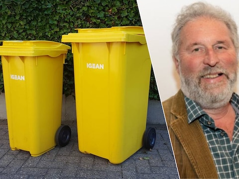 De containers voor papier en karton. Rechts: shepen Jo Van Havere.