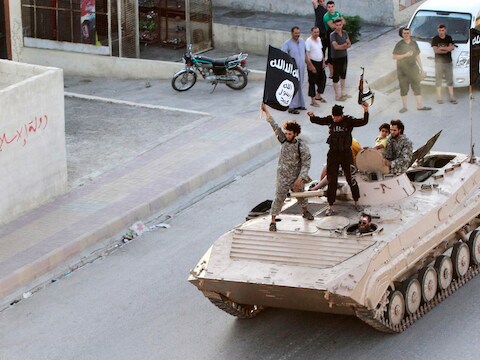 IS-militanten in de Syrische stad Raqqa.