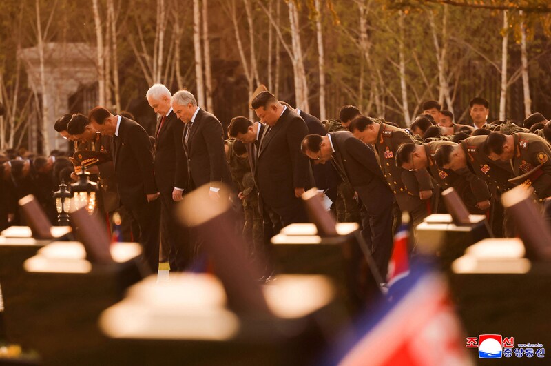North Korean leader Kim Jong-un (center), Russian Defense Minister Andrei Beloussov (4th from left) and Russian State Duma Chairman Vyacheslav Volodin (5th from left) during a moment of silence.