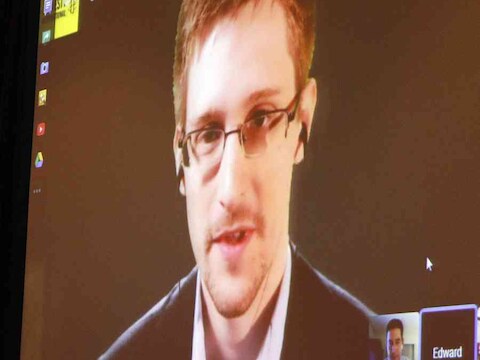 Edward Snowden en Glenn Greenwald (rechts onderin)