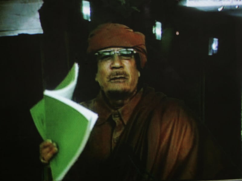 De Libische leider Moamer Kadhafi tijdens zijn televisiespeech gisterenavond.