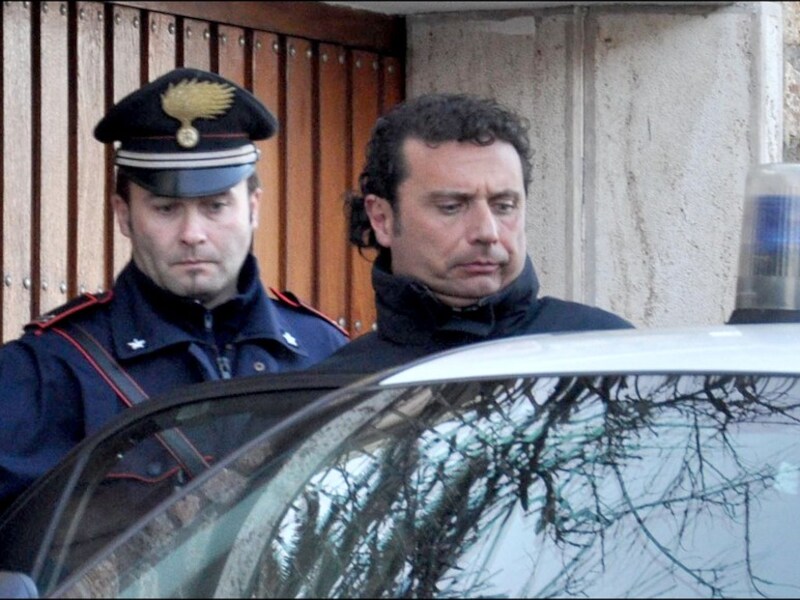 Kapitein Francesco Schettino bij zijn arrestatie. Hij gaf verstek tijdens de voorbereidende hoorzitting.