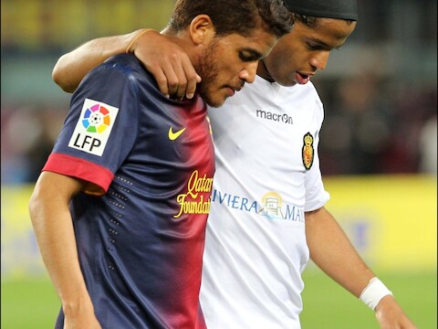 Jonathan dos Santos hier met zijn broer Giovanni dos Santos (r)