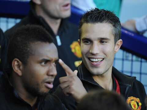 Anderson (L) naast Robin Van Persie.