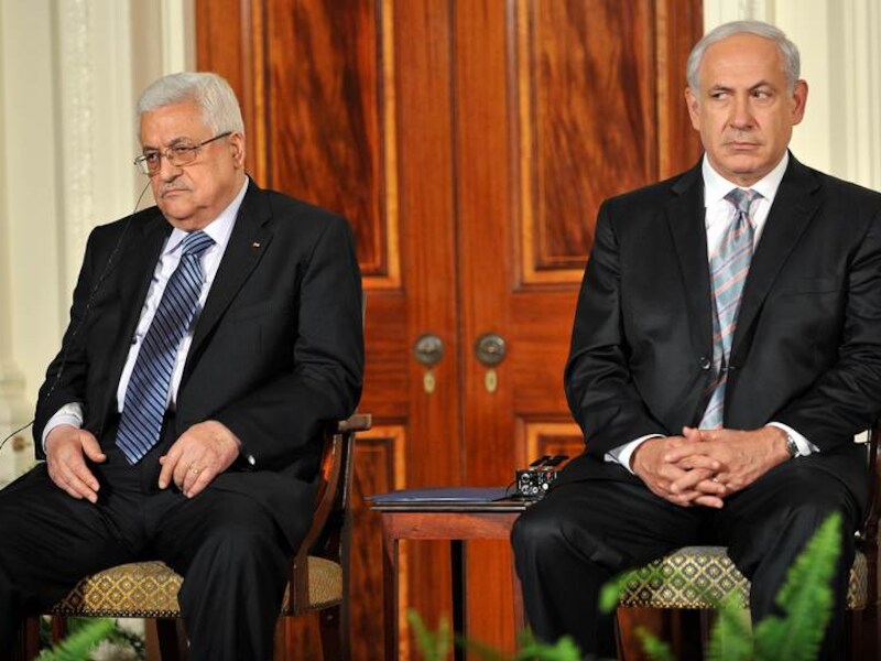 De Palestijnse president Mahmoed Abbas en de Israëlische eerste minister Benjamin Netanyahu.