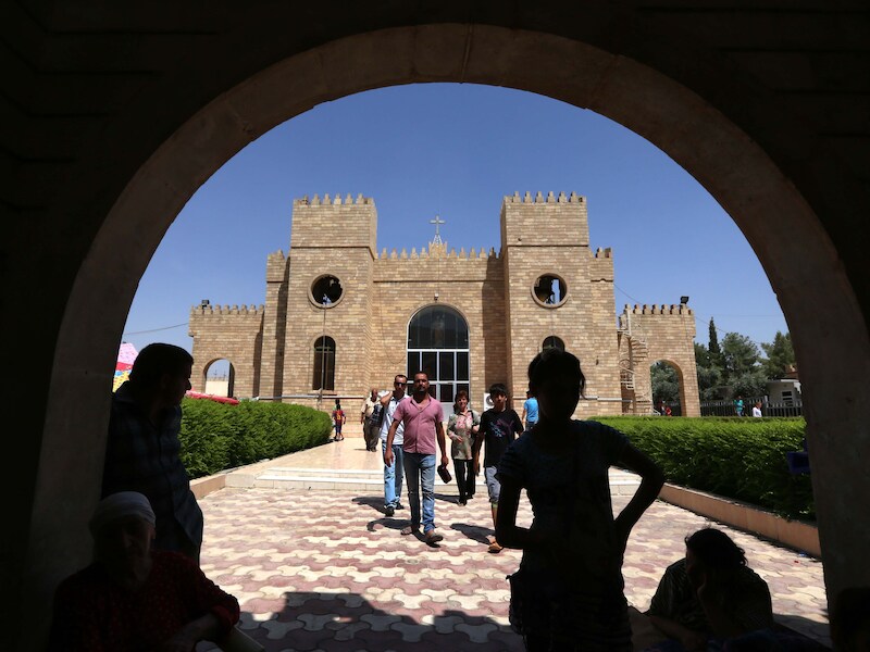 Christenen voelen zich bedreigd door IS en schuilen in een kerk in Arbil.