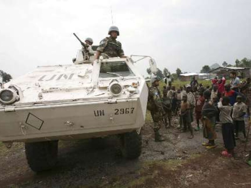 Urugayaanse Blauwhelmen op patrouillen in een vluchtelingenkamp nabij Goma in Oost-Congo.
