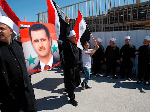 Druzen in de Golanhoogten vieren met een portret van de Syrische president Assad de Syrische onafhankelijkheidsdag, voorbije maandag.