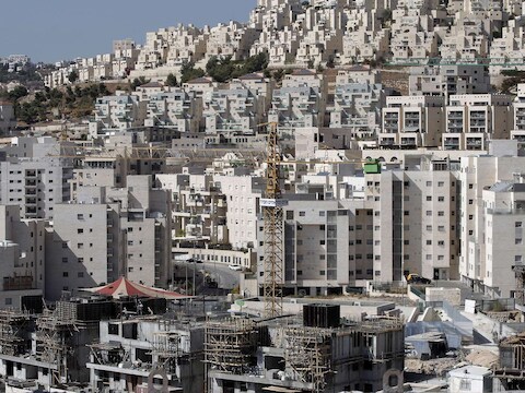 Een nederzetting in Oost-Jeruzalem. De Israëlische woningen in bezet gebied is een belangrijk obstakel voor de EU-ministers.
