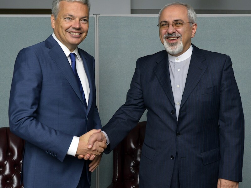 Minister van Buitenlandse Zaken Didier Reynders (L) met zijn Syrische evenknie Javad Zarif.