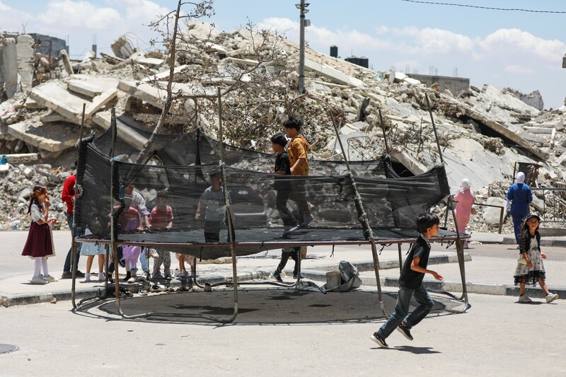 Palestinian children play in the devastated Gaza Strip