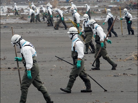 Reddingswerkers in Fukushima.