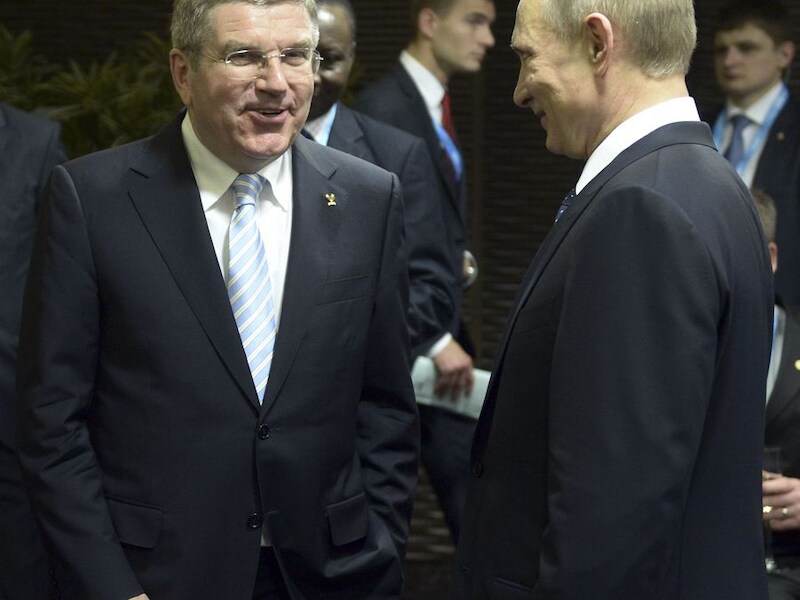 IOC-baas Bach met Poetin.
