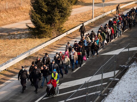 Vluchtelingen aan de grens tussen Oostenrijk en Slovenië.