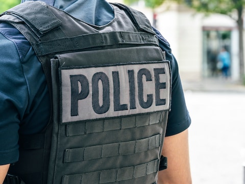 “Police” written on the back of a French police uniform (France)