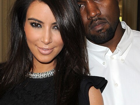 Kim Kardashian en Kanye West op 4 juli in Parijs.
