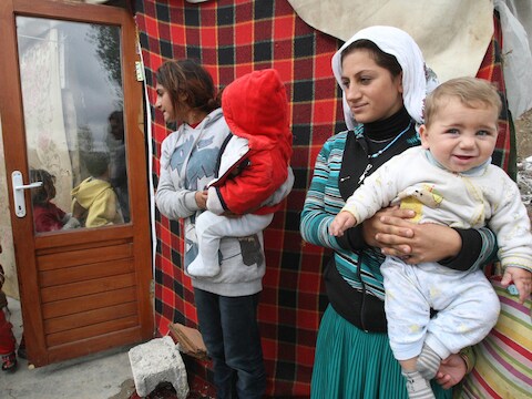 Syrische vrouwen met kinderen. De polio-slachtoffers zijn jonge kinderen.