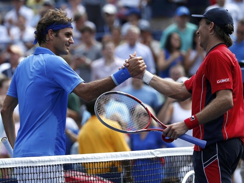 Roger Federer (l).