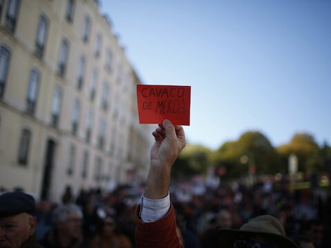 Protest aan het Portugese parlement tegen de begrotingsplannen voor 2014.