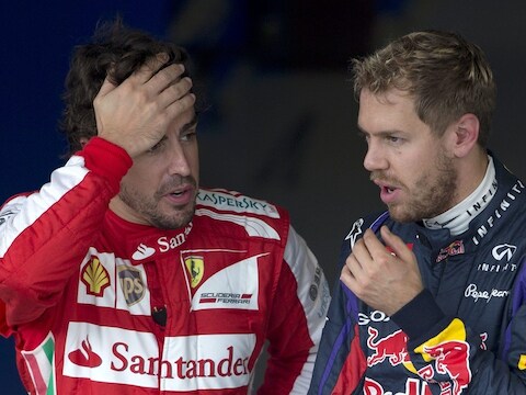 Ferrari-rijder Alonso (links) en Vettel