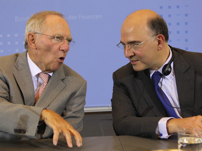 Schäuble (links) met Moscovici in mei van dit jaar in Berlijn.