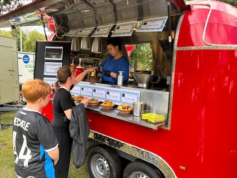 Illustratiebeeld van een foodtruckfestival elders