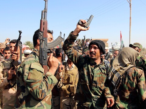Het Iraakse leger trekt militairen samen ten noorden van Bagdad, zoals hier bij Al-Udaim, voor een offensief tegen Tikrit.