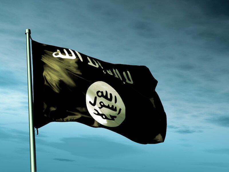 Een IS-vlag wappert in de wind.